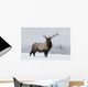 An elk standing in a field of snow with frozen trees in the background Wall Mural