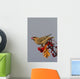 Bohemian Waxwing perches to eat Wall Mural