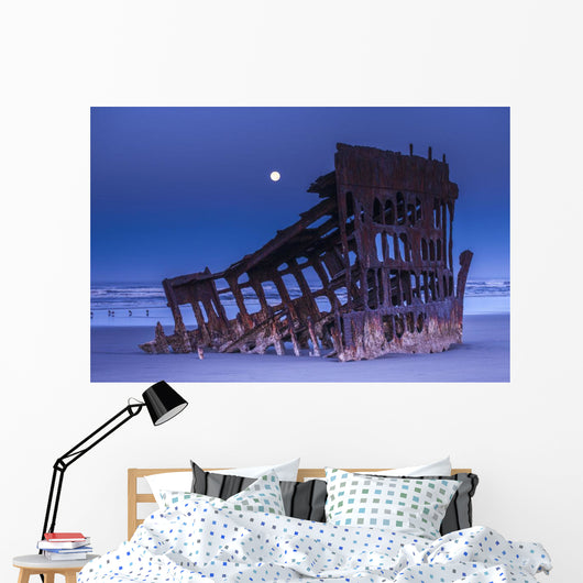 The moon sets over the wreck of the Peter Iredale Wall Mural