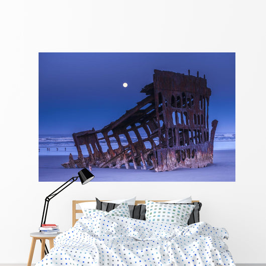 The moon sets over the wreck of the Peter Iredale Wall Mural