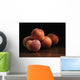 Peaches sitting on a wooden table Wall Mural