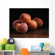 Peaches sitting on a wooden table Wall Mural