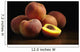 Peaches sitting on a wooden table, one cut in half Wall Mural