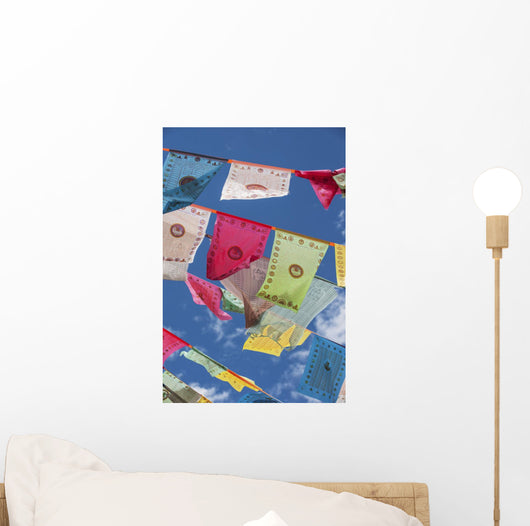 Prayer flags in the breeze Wall Mural