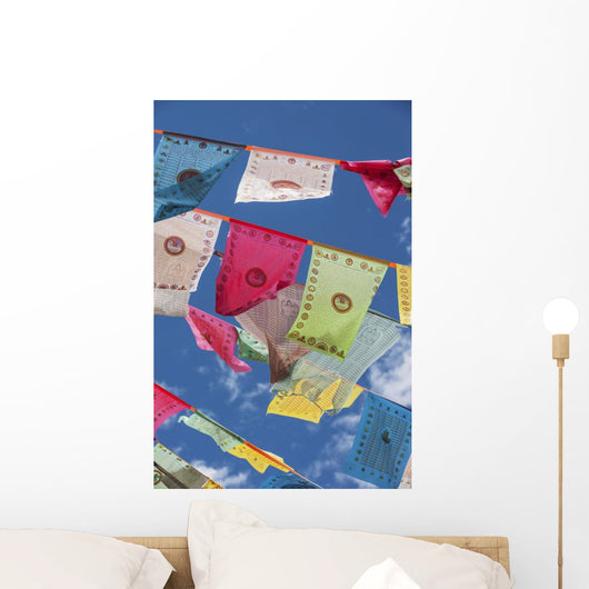 Prayer flags in the breeze Wall Mural