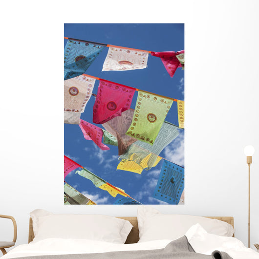 Prayer flags in the breeze Wall Mural