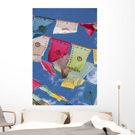 Prayer flags in the breeze Wall Mural