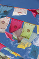Prayer flags in the breeze Wall Mural