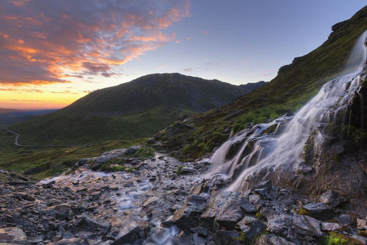 Scenic sunset view of a waterfall at Summit Lake State Recreation Site Wall Mural