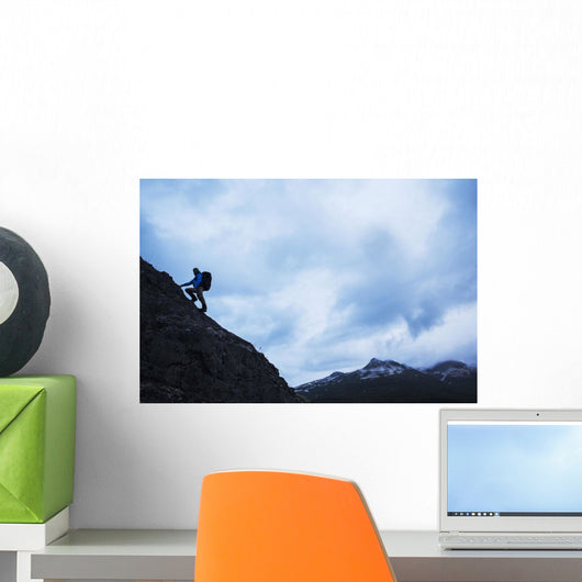 Swiss biologist and photographer climbing Wall Mural