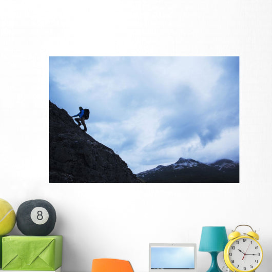 Swiss biologist and photographer climbing Wall Mural