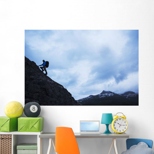 Swiss biologist and photographer climbing Wall Mural