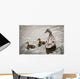 A mother mallard guards her ducklings Wall Mural