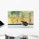 A brown frog sits on a window ledge looking outside at the rain Wall Mural