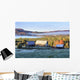 Rustic buildings and barn among autumn colors at sunrise Wall Mural