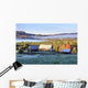 Rustic buildings and barn among autumn colors at sunrise Wall Mural