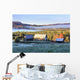 Rustic buildings and barn among autumn colors at sunrise Wall Mural