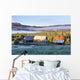 Rustic buildings and barn among autumn colors at sunrise Wall Mural
