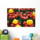 Green plastic baskets with organic red and yellow bell peppers Wall Mural