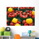 Green plastic baskets with organic red and yellow bell peppers Wall Mural