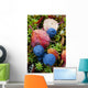 Close up of blueberries amongst fall tundra plants and leaves Wall Mural