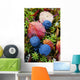 Close up of blueberries amongst fall tundra plants and leaves Wall Mural