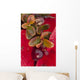 Macro of cranberries and deep red-orange leaves in the background Wall Mural