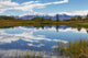 View of the snow capped mountains of the Alaska Range reflected Wall Mural