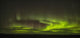 The aurora borealis and a shooting star above Hudson Bay Wall Mural