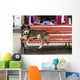 Dog sleeping on a red bench Wall Mural