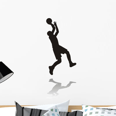 Silhouette Basketball Player shown on a wall