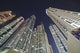 Skyscrapers illuminated at nighttime Wall Mural