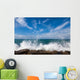 The waves breaking on a stony beach Wall Mural