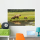 Adult sow Grizzly bear with two cubs Wall Mural