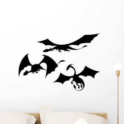 Three Dragon Silhouettes Wall Stickers shown on a wall