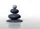 Zen - Stones in Balanced Pile in Calm Water Wall Mural