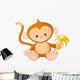 Baby Monkey Eating Banana