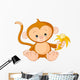 Baby Monkey Eating Banana