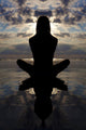 Silhoutte seated yoga pose. Wall Mural