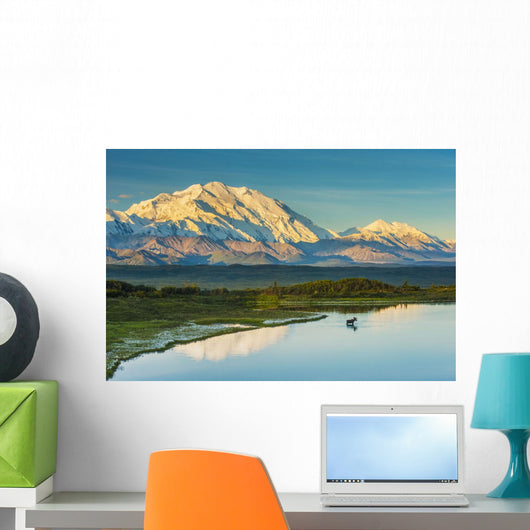A silhouette of a bull moose feeding Wall Mural