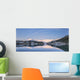 Snowy scenic reflected in the waters of Harrison Lagoon at sunrise Wall Mural