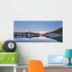 Snowy scenic reflected in the waters of Harrison Lagoon at sunrise Wall Mural