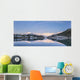 Snowy scenic reflected in the waters of Harrison Lagoon at sunrise Wall Mural