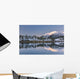 Snowy scenic reflected in the waters of Harrison Lagoon at sunrise Wall Mural