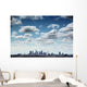Downtown Los Angeles skyline under blue sky with scenic clouds Wall Mural