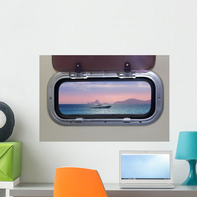 Boat Porthole Sunset Red shown on a wall