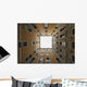 Low angle view to the sky from inside the four walls of a building Wall Mural