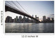 Brooklyn Bridge heading into Manhattan at dusk Wall Mural