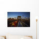 Pedestrian path on Brooklyn Bridge heading into Manhattan at night Wall Mural