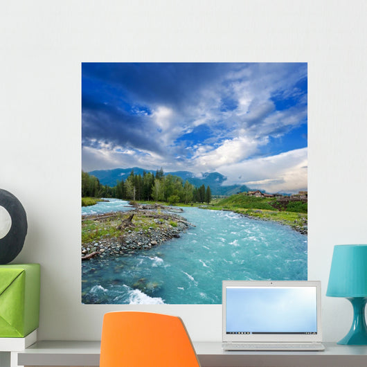 emerald river in a mountains Wall Mural